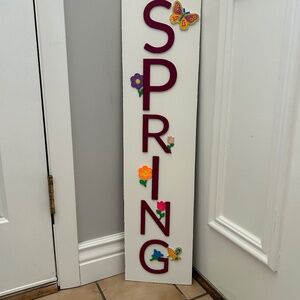 Spring door sign